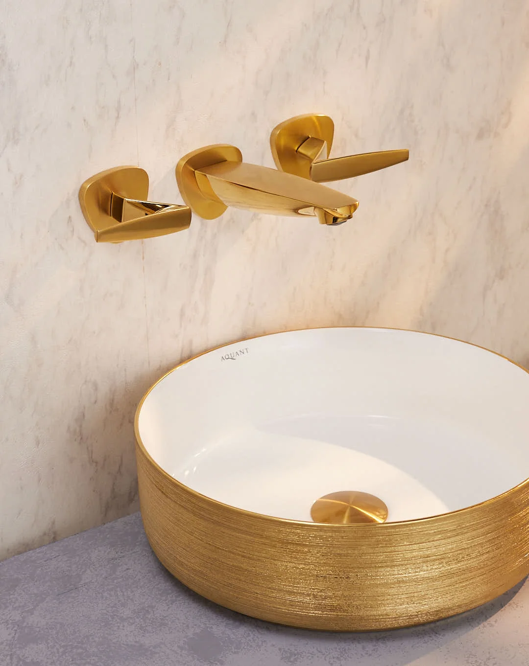 Brass basin mixer, marble counter and warm wood vanity
